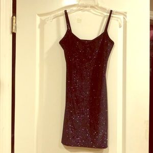Fitted little black dress with sparkles